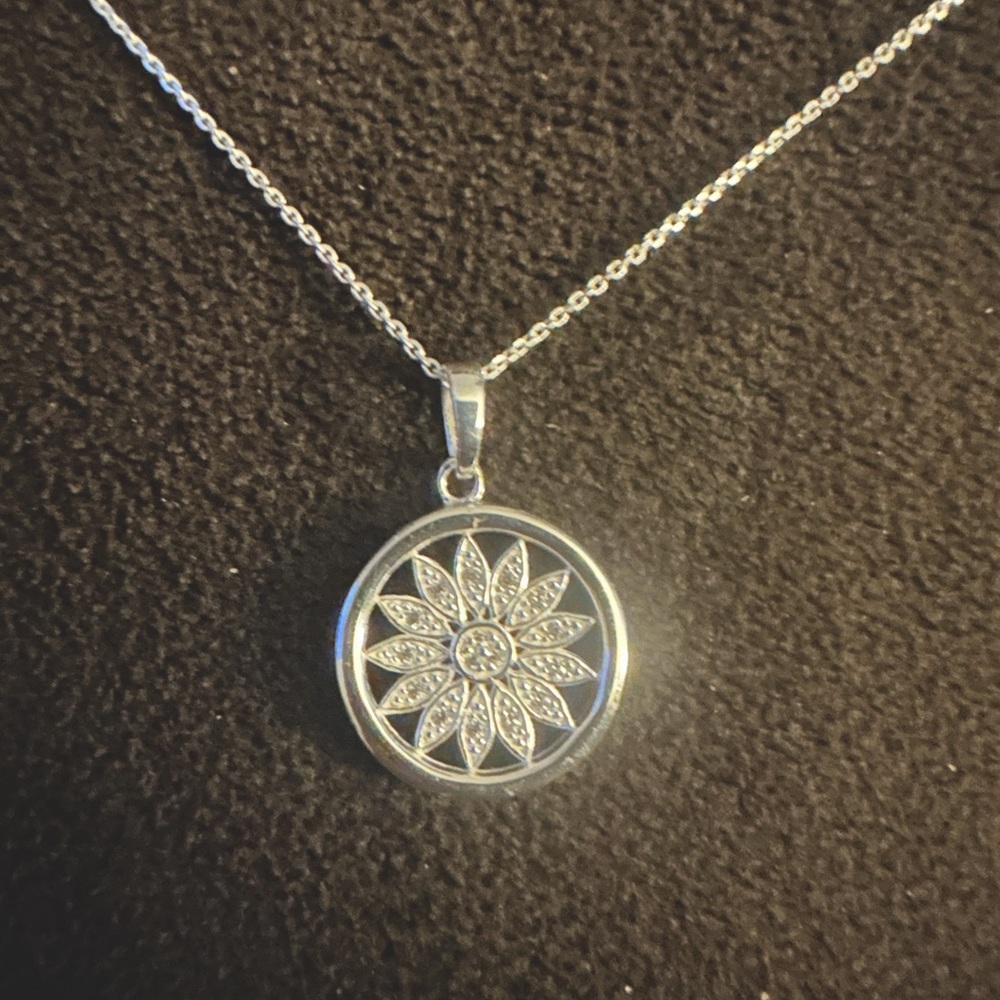 Sterling silver. Sunflower necklace (does not come with box)